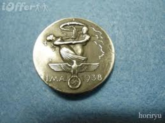 Jews must sell their businesses and real estate and hand over their securities and jewelry to the government at artificially low prices.