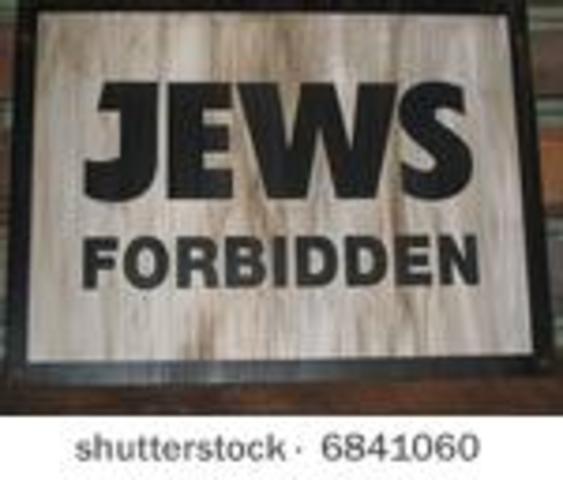 Jehovah's Witnesses are banned from all civil service jobs and are arrested throughout Germany.