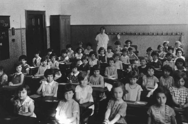 All Jewish children are expelled from German schools and can attend only separate Jewish schools.
