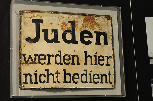 A nationwide boycott of Jewish-owned businesses in Germany is carried out under Nazi leadership.