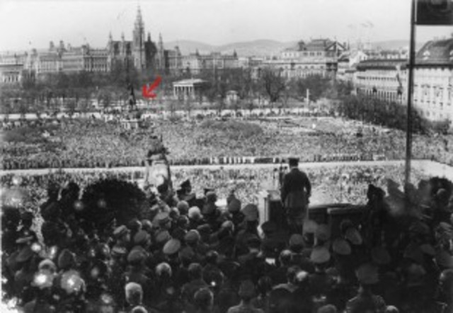 Hitler is welcomed into Austria and gives a speech from Vienna