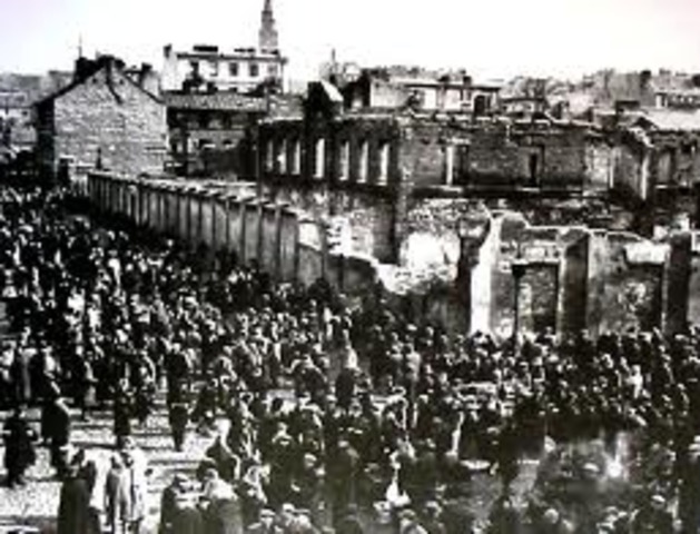 The Warsaw ghetto is closed off with approximately 500,000 inhabitants.