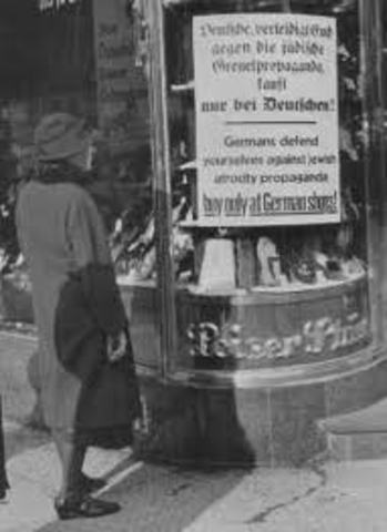A nationwide boycott of Jewish-owned businesses in Germany is carried out under Nazi leadership.