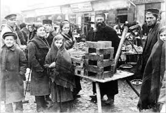 Jews must sell their businesses and real estate and hand over their securities and jewelry to the government at artificially low prices.