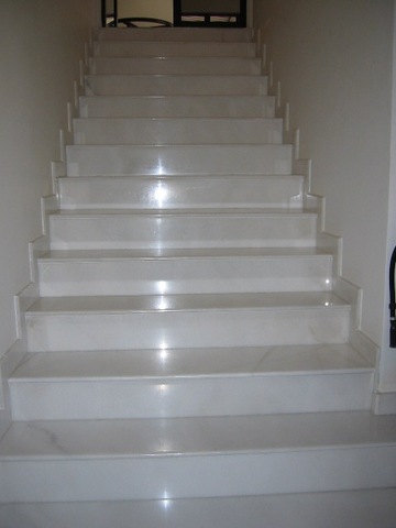 "Then these seperate sounds collided into the general tumult of his body falling clumsily down the white marble staris."