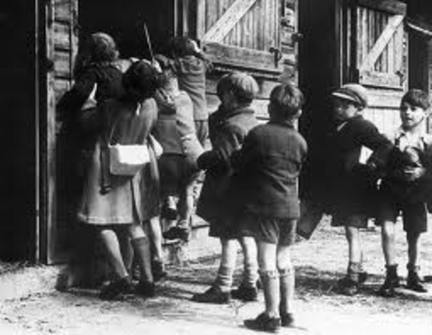 The law against "overcrowding in German schools and universities" is adopted, restricting the number of Jewish children allowed to attend. Children of war veterans and those with one non-Jewish parent are initially exempted.