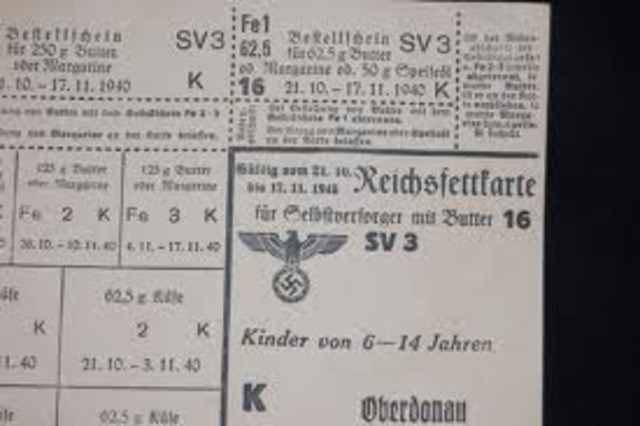 Jews are forced to turn in radios, cameras, and other electric objects to the police. Jews receive more restrictive ration coupons than other Germans. They do not receive coupons for meat, milk, etc. Jews also receive fewer and more limited clothing ratio