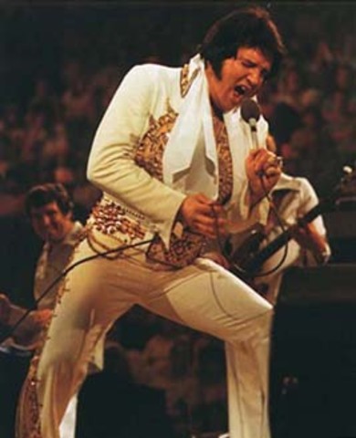 Elvis collapses during a concert and is rushed to the hospitle.