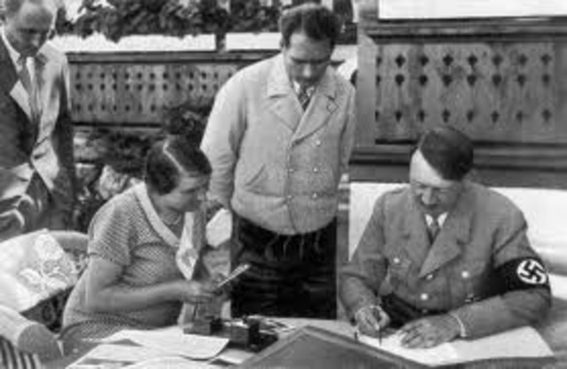 Hitler and Stalin sign a non-aggression treaty, including the partitioning ofPoland in the event of a war