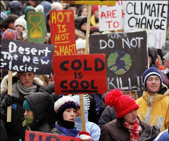 The Kyoto protocall comes  into act requiring countires to reduce their greenhouse gas emissions by 5.2% in comparison to their 1990 numbers