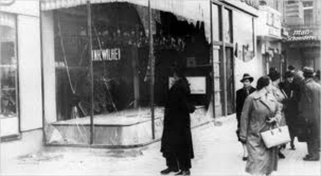 Kristallnacht ("Night of Broken Glass"): Nazi organized nation-wide pogroms result in the burning of hundreds of synagogues; the looting and destruction of many Jewish homes, schools, and community offices; vandalism; and the looting of 7,500 Jewish store