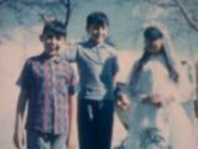 Mi primera comunión, junto a mis hermanos y mi madre