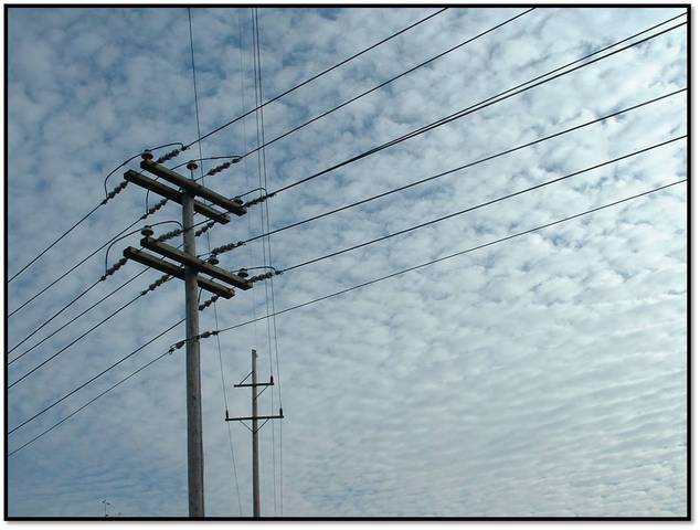 Developed overhead electric conducting lines during 1888.