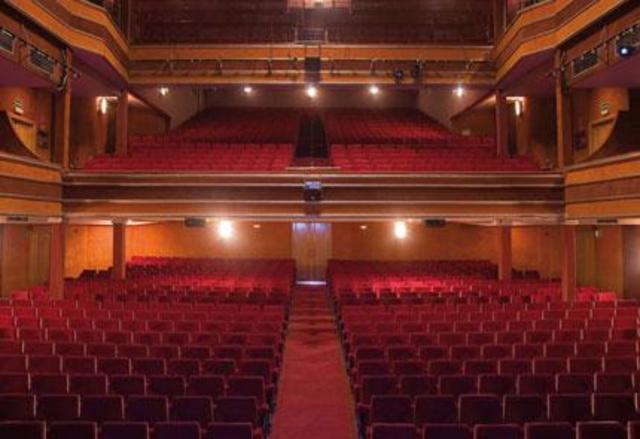 He represents a work of theater.