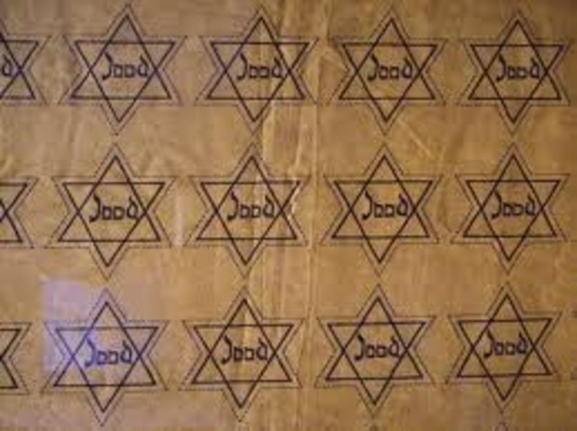 Jews in France and the Netherlands are required to wear identifying Stars of David.