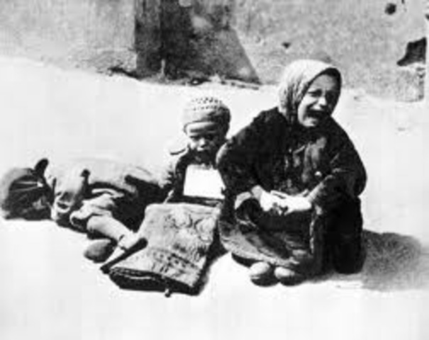 The Warsaw ghetto is closed off with approximately 500,000 inhabitants.