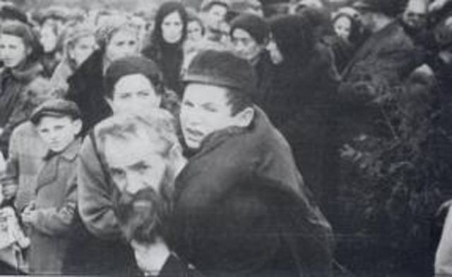 The prisoners at Auschwitz-Birkenau rebel and blow up one crematorium.