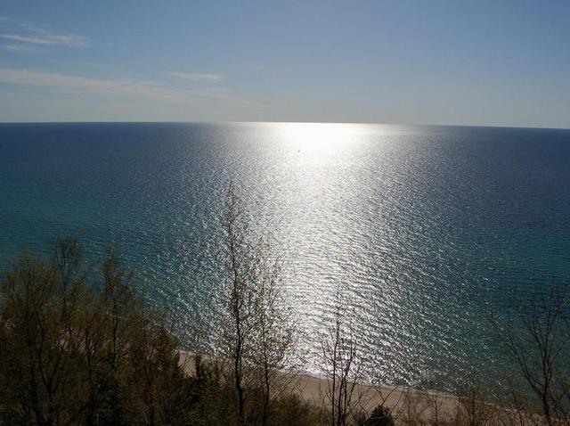 Gram, Gramps, and Sal stop at Lake Michigan for a quic splash in the water.
