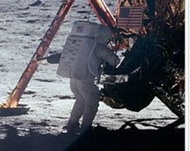 Neal Armstrong walks on moon; we see it on TV