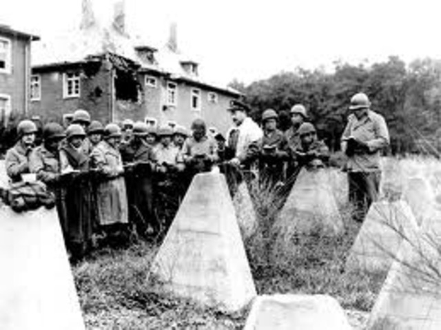 April	 Troops from the United States liberate survivors from the Buchenwald and Dachau concentration camps.
