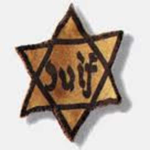 Anti-Jewish laws are passed by France's Vichy Government.