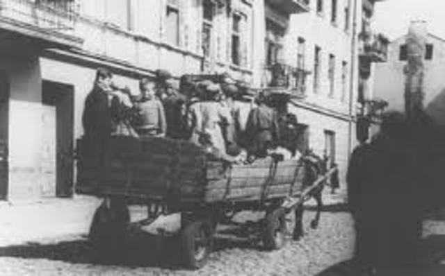 Jews in the Lódz ghetto are deported to the killing center at Chelmno.