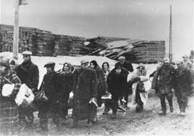 Jews in the Lódz ghetto are deported to the killing center at Chelmno.