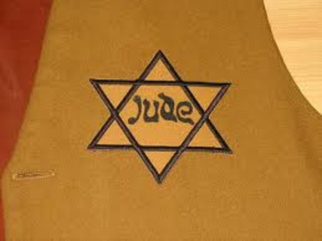Jews in France and the Netherlands are required to wear identifying Stars of David.