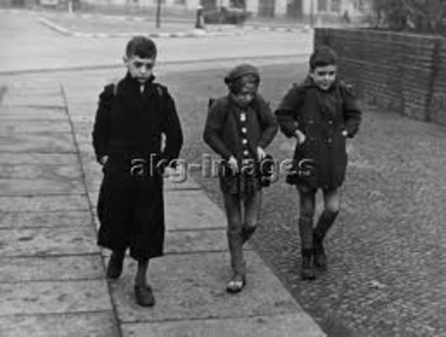 The German government announces Jews must carry identification cards.