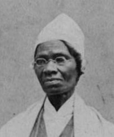 Sojourner Truth gives her famous "Ain't I a Woman" speech.