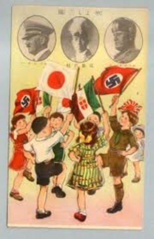 Germany, Italy, and Japan sign the Tripartite Pact.