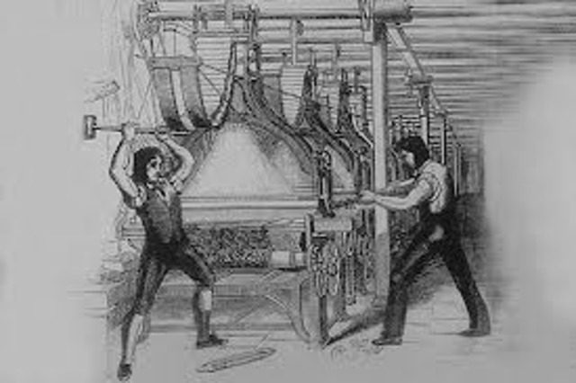 Textile workers smash machinery