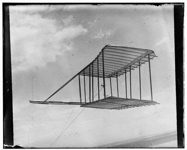 The Wright brothers test their 1900 glider in Kill Devil Hills, North Carolina