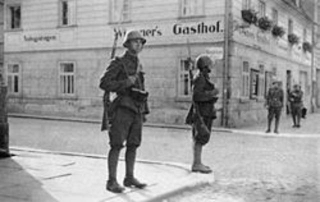 Czechoslovakia is weakened as the Sudenland is ceded to Germany at the Munich conference