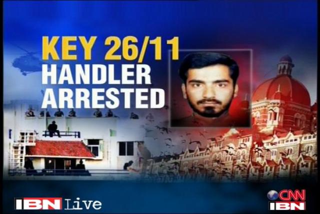 key 2/11 handler arrested