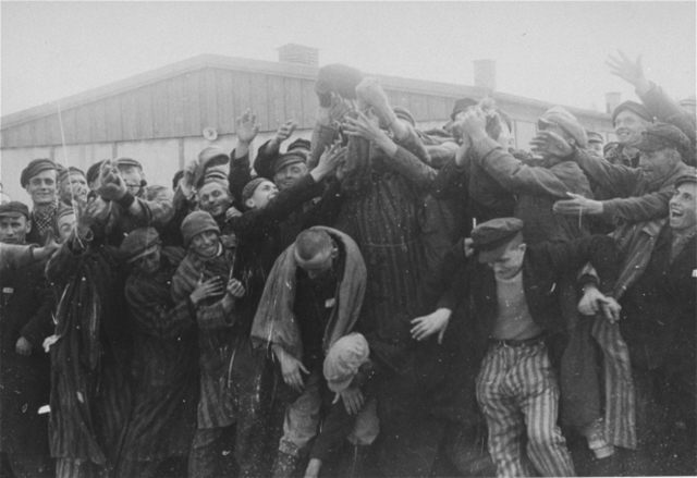 Troops from the United States liberate survivors from the Buchenwald and Dachau concentration camps.