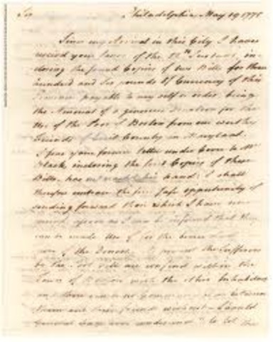 The hanging off the sign