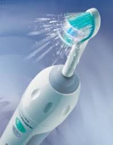 First electric toothbrush