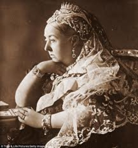 Queen Victoria signs the Australian constitution