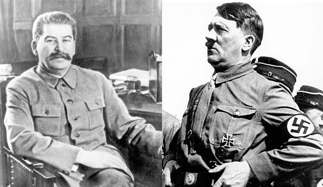 Joseph Stalin and Adolf Hitler sign the Nazi-Soviet Pact.