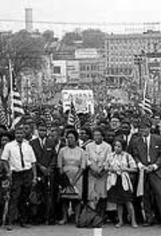 25,000 demonstrators join the marchers when they reach Montgomery