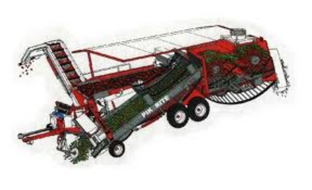 Gordie C. Hanna invents tomato harvester