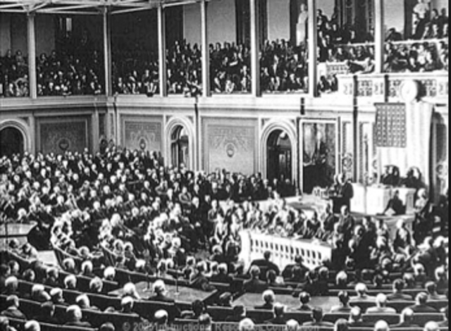 United Staes of America declare war on Japan, entering World War II