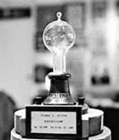 Edison invents the electric light
