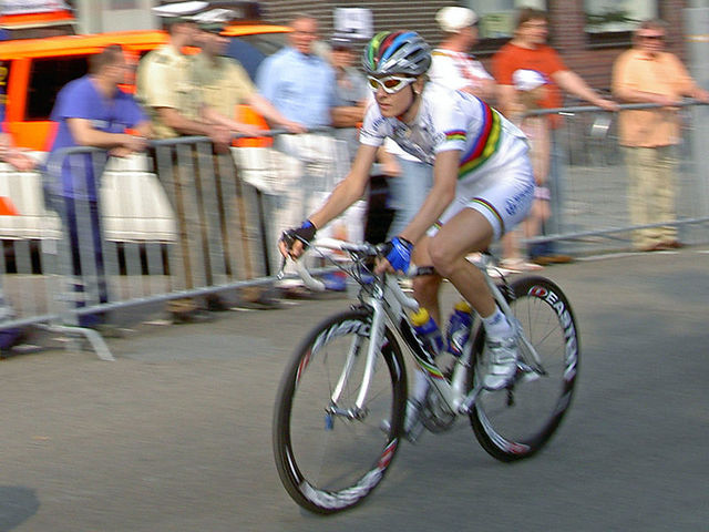 Judith Arndt, an out lesbian wins  2nd place in olympic cycling competition
