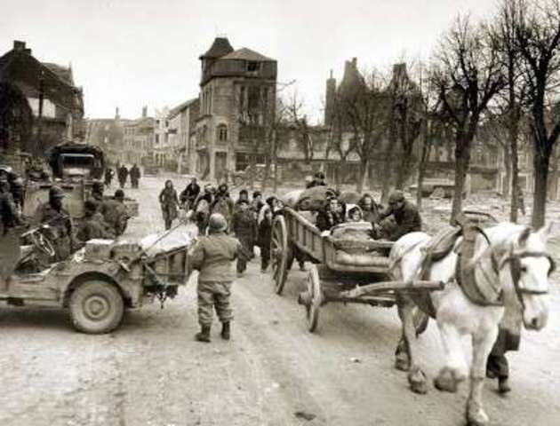German attack through Ardennes - Battle of the Bulge begins.