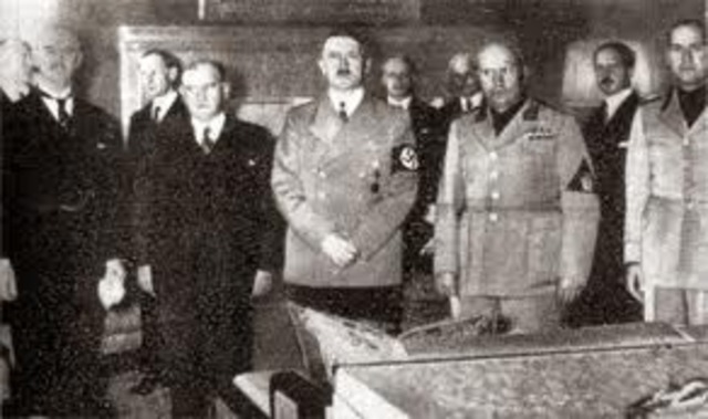 Germany, Italy, Great Britain, and France sign the Munich agreement which forces the Czechoslovak Republic to cede the Sudetenland, including the key Czechoslovak military defense positions, to Nazi Germany.
