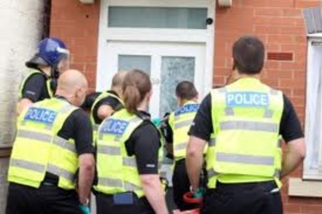 Gestapo officers raid house