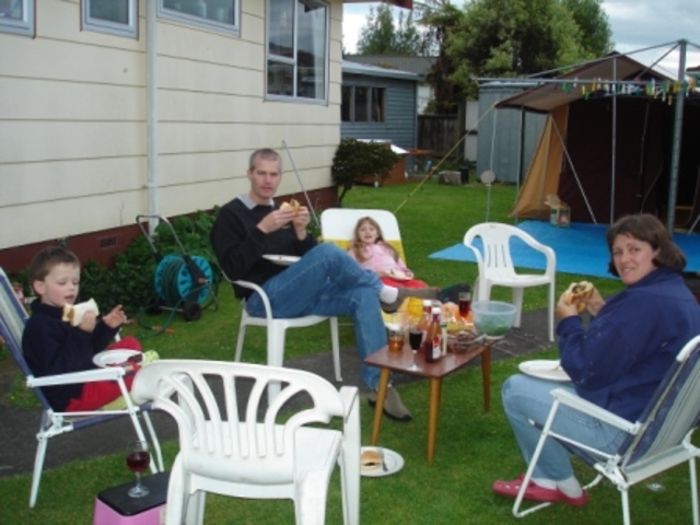 Putting up the tent in the back yard and having BBQ's.