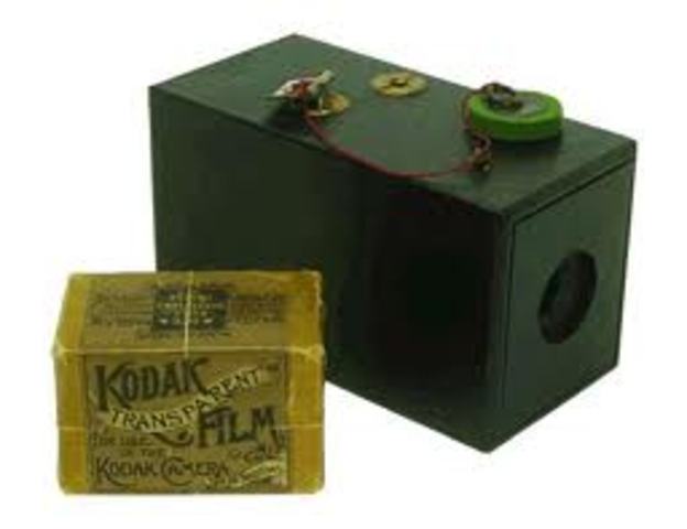 George Eastman's company Kodak introduces small cameras that use "dry" film